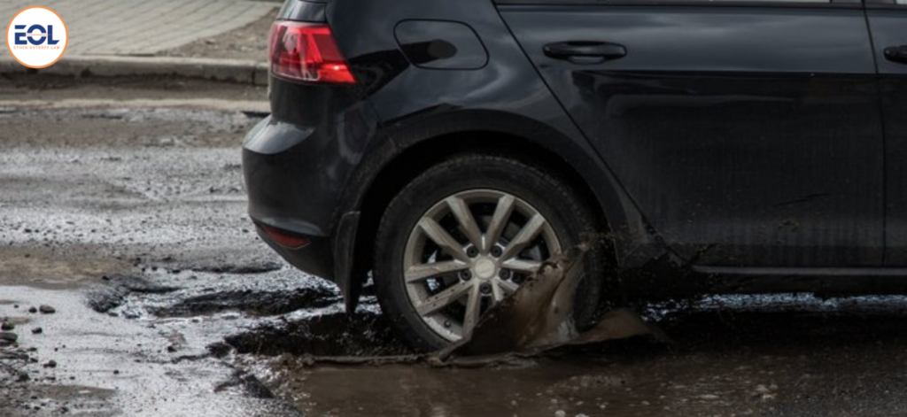 car damaged by pothole who is liable