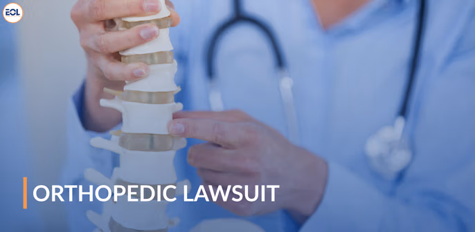 Medical professional examining a spinal model, emphasizing orthopedic lawsuit context.