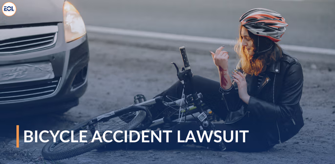 Bicycle accident scene with injured cyclist in protective gear, emphasizing the need for legal guidance on bicycle accident lawsuits.